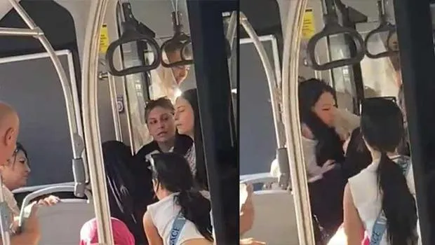 Denizli'de belediye otobüsünde yolcular arasında kavga: Tesettürlü kadına kıyafeti üzerinden hakaret eden şüpheli gözaltına alınmıştır